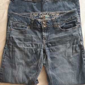 Refuge flare legged jeans by Charlotte russe size 10